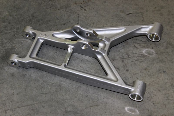 Рычаг подвески задний левый нижний