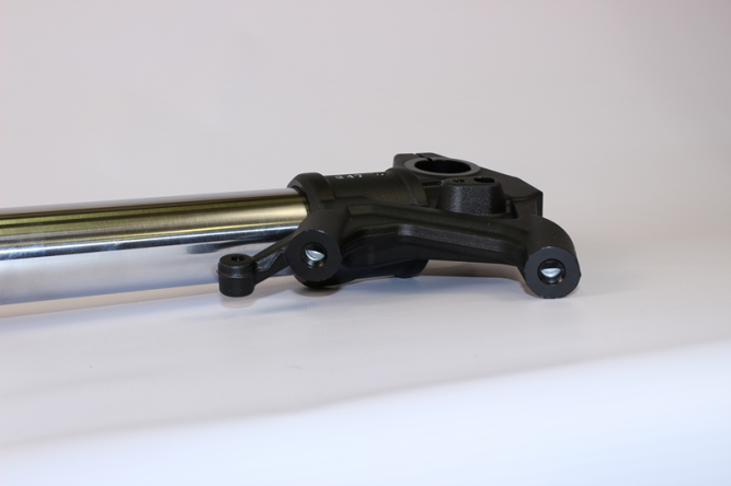 Амортизатор передний левый