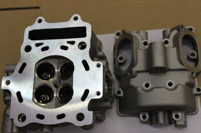 Голова цилиндра с клапанной крышкой