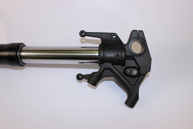 Амортизатор передний левый