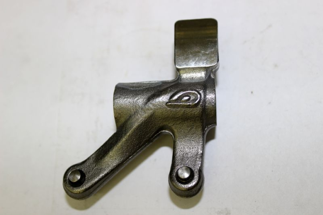 Коромысло распределительное, выпускное