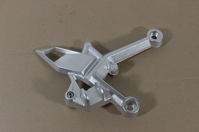 Кронштейн правой подножки