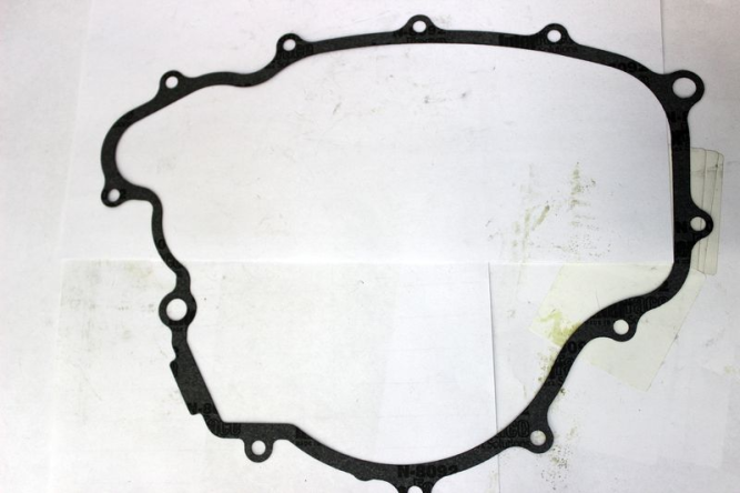 Прокладка крышки левой половины картера