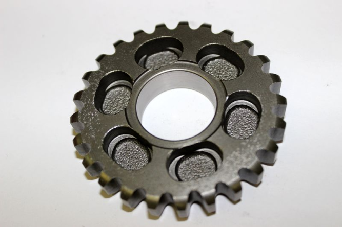 Шестерня обратного вращения