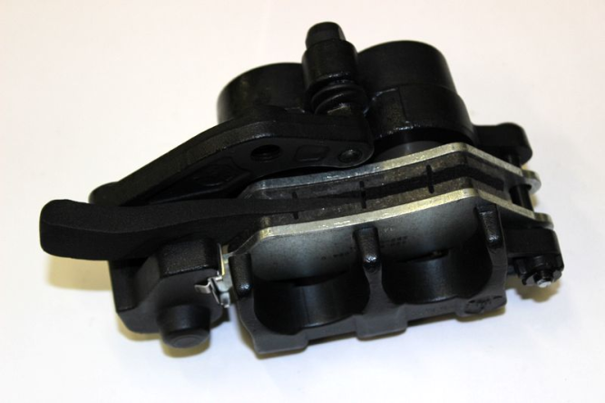 Суппорт тормозной, передний, левый