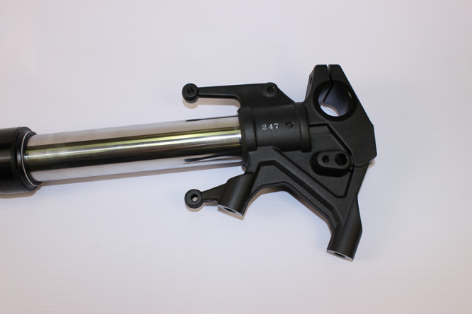 Амортизатор передний левый